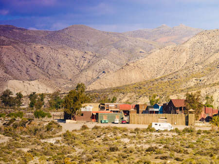 Tabernas Desert, Almeria, Spain - January 9, 2020: Western Leone village, movie location set for spaghetti western in desert. View from distance.のeditorial素材