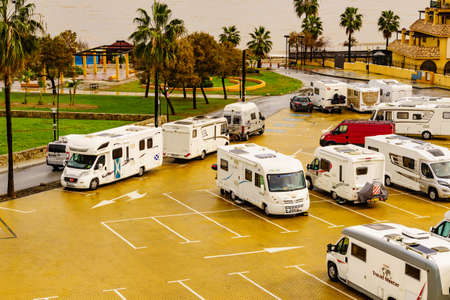 Fuengirola, Malaga, Spain - January 25, 2020: Parking area with many caravans on coast in Fuengirola city. Costa del Sol, Andalusia.のeditorial素材