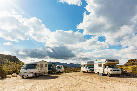 COCEDORES BEACH, SPAIN - MARCH 19, 2019: Many camper cars camping on Cocedores Beach at Mediterranean sea, Murcia region Spain.のeditorial素材