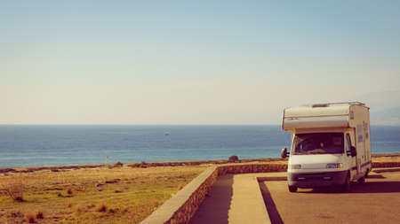 Caravan rv camping on mediterranean coast in Spain. Holiday trip in mobile home.の写真素材