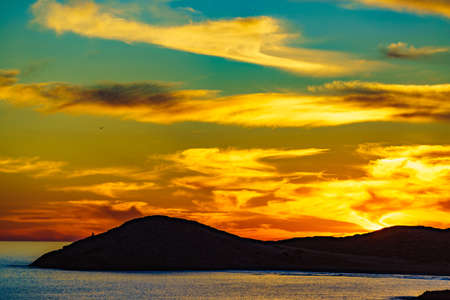 Scenic sunset over sea. Seaside landscape. Calblanque Beach, Murcia Spain.の写真素材