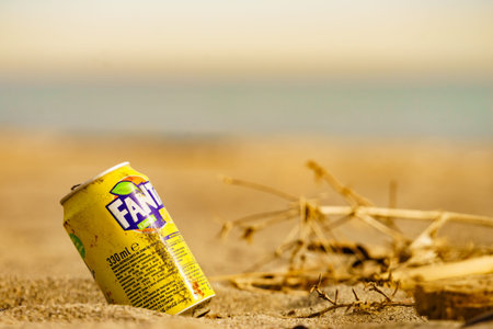 Punta Mala, Andalucia, Spain - 29 January 2020: Fanta drink used can on beach. Fanta is brand of...