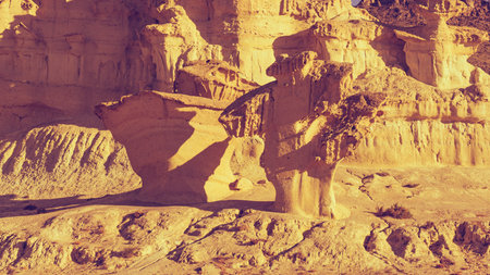 The Enchanted City of Bolnuevo, yellow sandstone shapes, rock formations, Murcia Spain. Tourist...