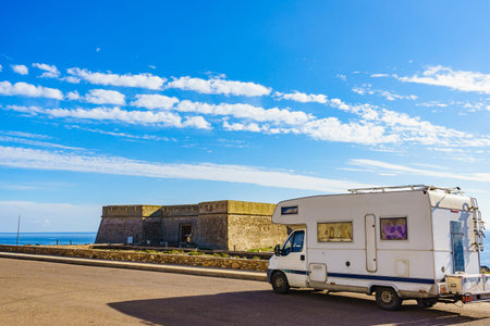 Caravan on coastal fortification, castle near the town of Los Banos de Guardias Viejas, Almeria...