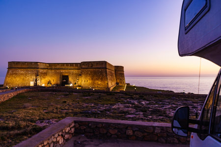 Caravan visitng coastal fortification, castle near the town of Los Banos de Guardias Viejas, Almerのeditorial素材