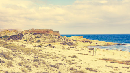 Castle San Ramon above beach of El Playazo, Cabo de Gata Nijar, province Almerのeditorial素材