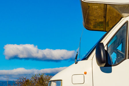 Camper vehicle camping on roadside. Traveling in motor home.の写真素材