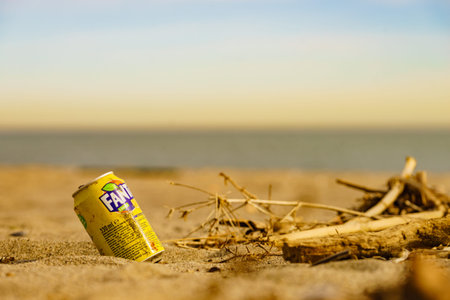 Punta Mala, Andalucia, Spain - 29 January 2020: Fanta drink used can on beach. Fanta is brand of...