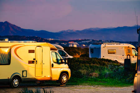 Caravan camping on mediterranean coast, beach Torrecarbonera, Punta Mala, Alcaidesa, Spain. Vacation and travelling in mobile home.の写真素材