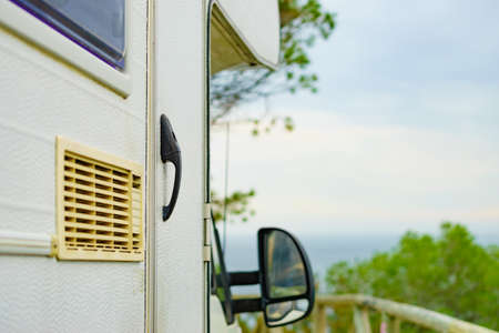 Camper car detail. Grid, ventilation plate for fridge. Caravan vacation.の写真素材