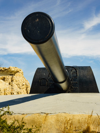 Travel destination. The Gun Battery of Castillitos in Spain. Military cannon for coastal defense,...
