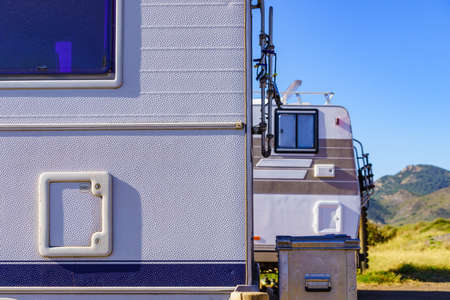 Details of camper car recreation vehicle, toilet exterior service door.の写真素材