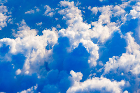 View from airplane window to clouds