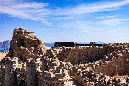 Tourist site. Battery de Castillitos in Spain Cartagena, Cabo Tinoso. Military cannon for coast defense, naval gun batteries. Guns of Mazarron.の写真素材