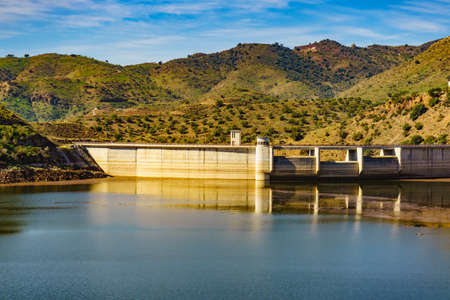 Spanish landscape. Casasola Dam and surrounding countryside, Malaga province in Andalusia, Spainの写真素材