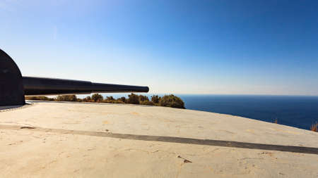 Tourist site. Battery de Castillitos in Spain Cartagena, Cabo Tinoso. Military cannon for coast defense, naval gun batteries. Guns of Mazarron.の写真素材