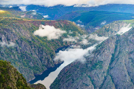 Morning clouds over river Sil Canyon in Parada de Sil in Galicia, Spain. View from Cabezoa lookout. Mountain view. Place to visit.の写真素材