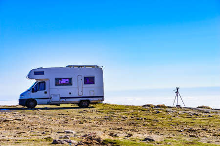 Caravan rv above clouds. Motor home camping car in mountain nature in Portugal. Adventure with camper vehicle.の写真素材