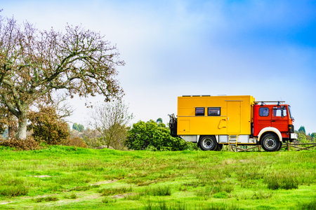 Off road camper 4x4, rv motor home on nature. Travel with motorhome truck.の写真素材