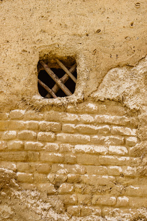 Old clay house detail, bars in window. El Chorrillo film location, Sierra Alhamilla in Andalucia Spain.の写真素材