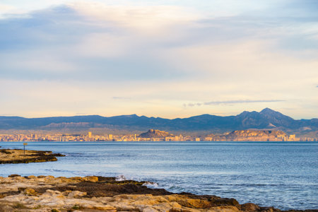 View on mediterranean coast seaside spanish Alicante city on Costa Blanca, Valencia, Spain. View from distance.の写真素材