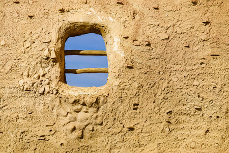 Old clay house detail, bars in window. El Chorrillo film location, Sierra Alhamilla in Andalucia...
