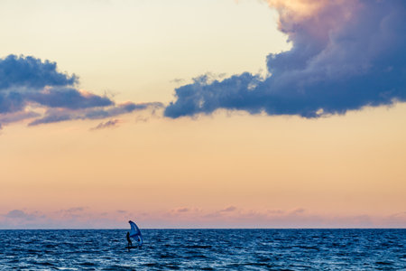 Surfer in sea water. Sports activity.の写真素材