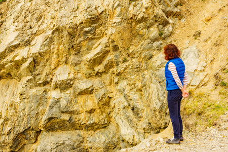 Woman walking on mountain nature.