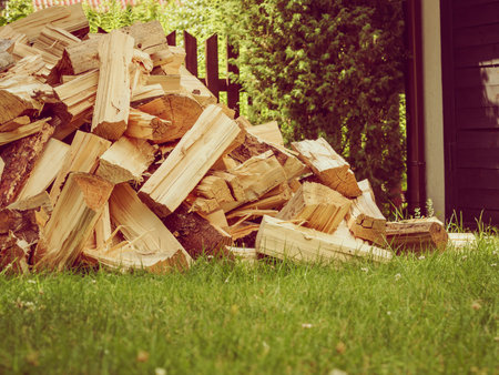 Stack of chopped firewood outside. Preparation for winter.