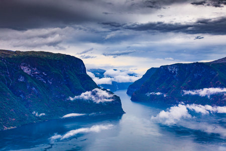 Aurlandsfjord fjord landscape with clouds over sea surface. Norway Scandinavia. National tourist route Aurlandsfjellet.の写真素材