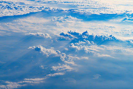 View from airplane window to clouds