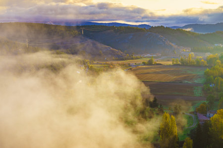 Morning view, fog over valley, Aguilar de Campoo, province of Palencia, Castile and Leon community, northern Spain.の写真素材