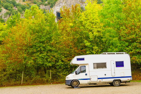 Camper rv camping on nature in mountains, Spain. Adventure with motor home.の写真素材