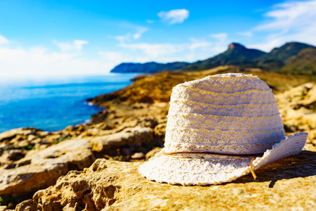 Summer hat on mediterranean sea coast. Murcia region, Calblanque Regional Park in Spain. Hiking, camping, active lifestyle.の写真素材