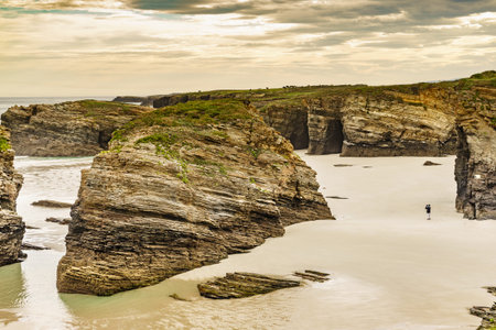Cliff formations on Cathedral Beach in Galicia Spain. Playa de las Catedrales, As Catedrais in Ribadeo, province of Lugo. Cantabric coastline in northern Spain. tourist attractions.の写真素材