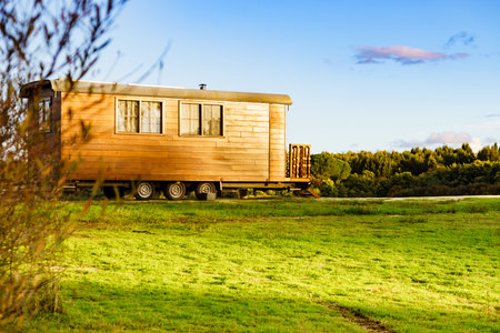 Caravan wooden construction trailer used as tiny house.の写真素材