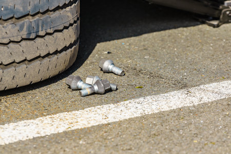 Changing tire car on road. Auto repairの写真素材