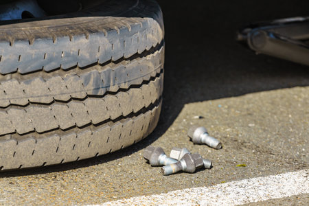 Changing tire car on road. Auto repairの写真素材