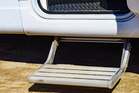 Metal steps of camper car recreation vehicle. Travel in motorhome, holidays.の写真素材