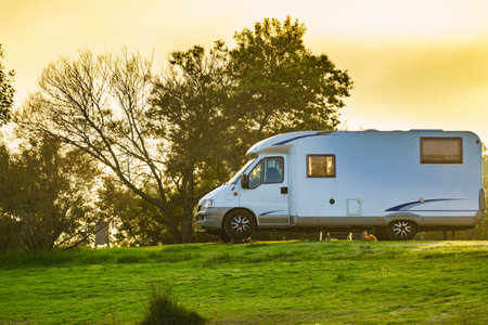 Camper vehicle camping on nature. Travel in wintertime.の写真素材