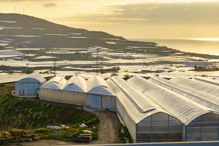Spanish landscape and view of sea coast with many plastic greenhouses. Almeria region, Andalusiaの写真素材