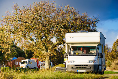 Camper vehicle camping on nature. Povoa e Meadas Dam in Castelo de Vide, Alentejo Portugal. Travel in motor home.の写真素材