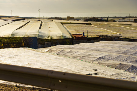 Spanish landscape and view of sea coast with many plastic greenhouses. Almeria region, Andalusiaの写真素材