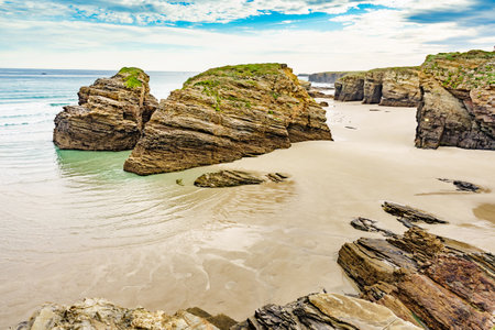 Beach of the Cathedrals, Playa las Catedrales in Ribadeo, province of Lugo, Galicia. Cliff formations on the Cantabric coast in northern Spain. tourist attractions.の写真素材