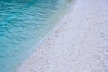 Clear blue water and white marble sand on famous Marble Beach on Thasos island Greeceの写真素材