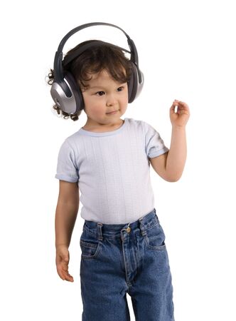 child with headphones,isolated on a white background.の写真素材