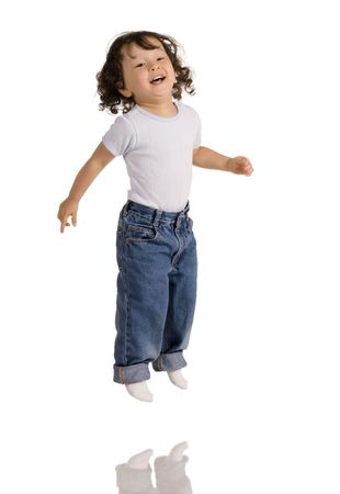 jumping child on whiteの写真素材