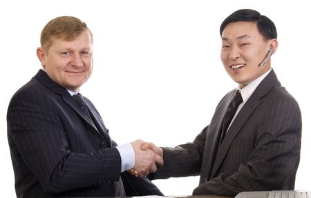 Two businessmen shakinghand on a white background.の写真素材