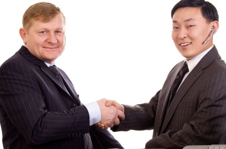 Two businessmen shakinghand on a white background.の写真素材