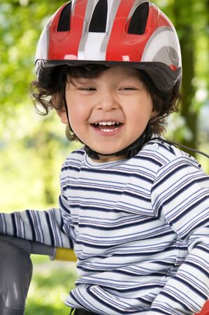 The child in a protective helmetの写真素材